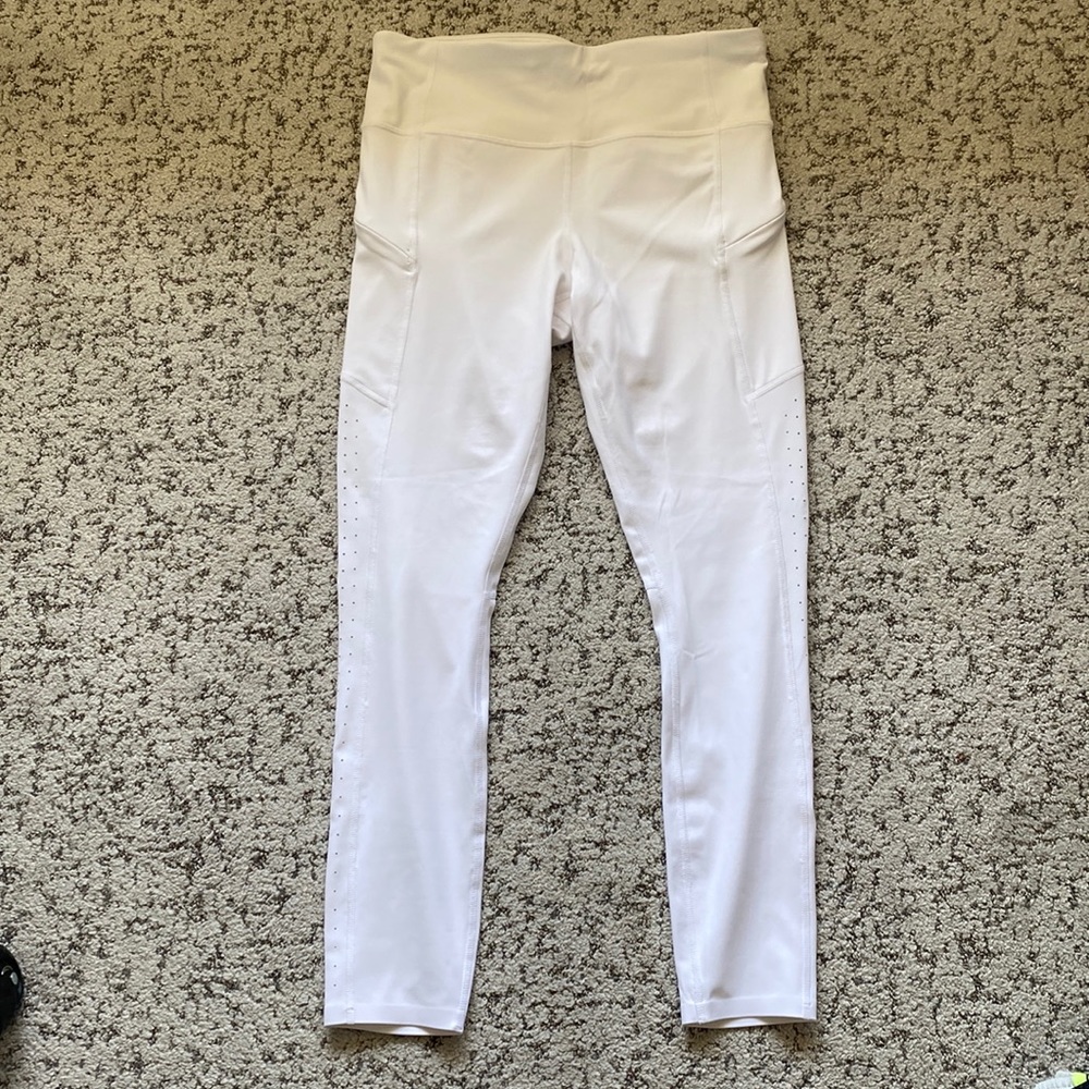 Athleta White Tights w/ zippered side pockets, laser cut on side panels sz S